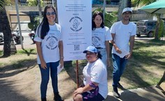 Participantes do projeto na orla (Divulgação)