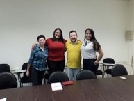 As servidores com a professora Simone da Silveira Borges, coordenadora geral de Programas Acadêmicos da UFC e o professor Gerardo Viana Jr, coordenador Institucional do Pibid UFC