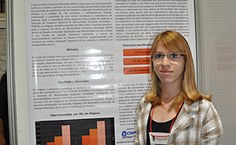 Nathália Horácio, uma das expositoras, apresenta o trabalho Inclusão Financeira Produtiva e Desenvolvimento Local - Um Diagnóstico do PNMPO em Alagoas