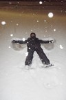 Carlos em momento de lazer, fazendo o  snow angel