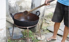colher de pau e tacho de cobre para fazer os doces