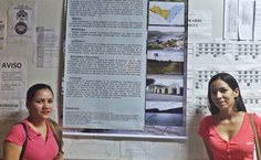 Estudantes Alinne Balbino e Paula de Holanda apresentando trabalhos