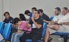 Professores e alunos assistem e interagem com a Professora Patrícia Maillard na abertura do 7º Seminário de avaliação do Pibiti