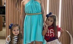 A médica Roberta Caldas com seus filhos